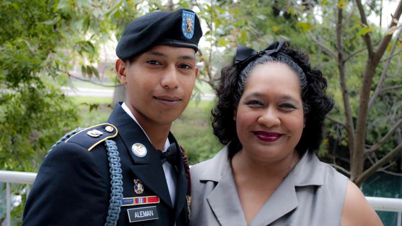 Pvt. Emmanuel Aleman poses with his mother Marita Maldonado.