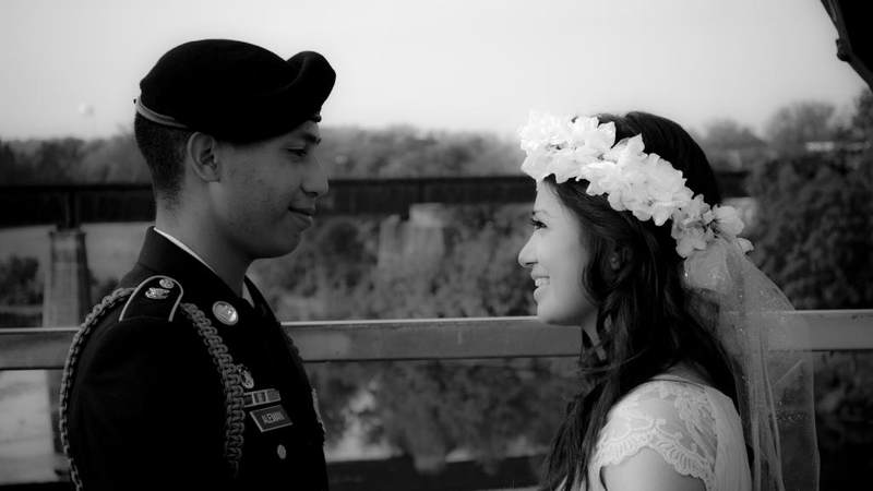 Pvt. Zoe Tunchez and Pvt. Emmanuel Aleman smile at their wedding.