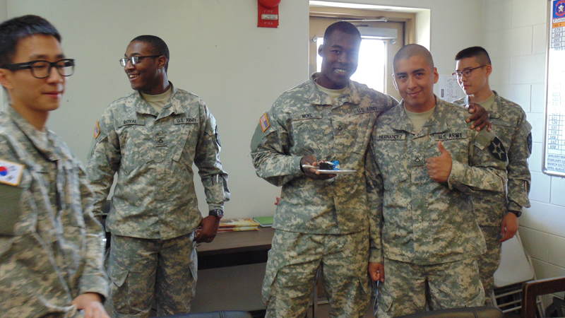 Soldiers enjoy birthday cake at Camp Humphreys, South Korea.