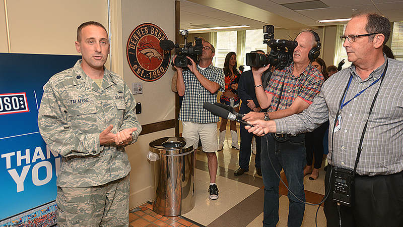 The USO opened its latest Military Entrance Processing Station location on Tuesday in Denver with help from the Super Bowl Champions. The event -- in coordination with the NFL's Salute to Service campaign -- included a meet-and-greet with former Denver Broncos players and Broncos cheerleaders and a tailgate lunch.