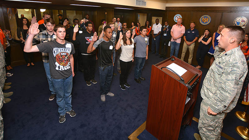 The USO opened its latest Military Entrance Processing Station location on Tuesday in Denver with help from the Super Bowl Champions. The event -- in coordination with the NFL's Salute to Service campaign -- included a meet-and-greet with former Denver Broncos players and Broncos cheerleaders and a tailgate lunch.