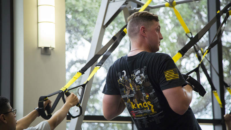 Service members exercise at the new USO wellness center on Joint Base San Antonio.