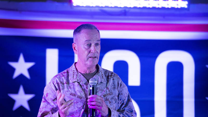 Marine Gen. Joseph Dunford, the chairman of the Joint Chiefs of Staff, speaks to the crowd before the USO show at Al Udeid Airbase in Qatar.