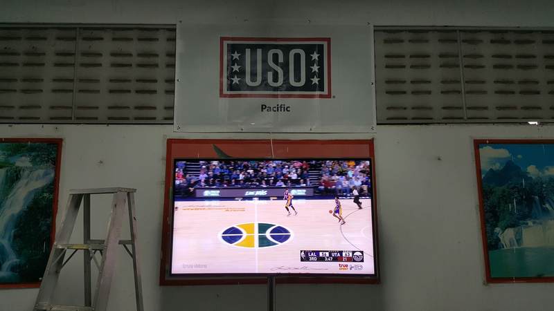 Satellite television inside a 1,200 square-foot, air-conditioned tent provides a touch of home to service members deployed for training exercises Cobra Gold and Pacific Pathways.
