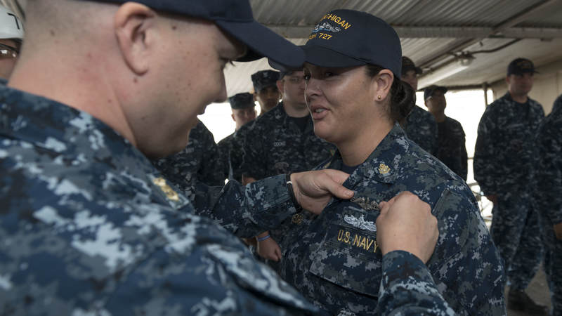 Chief Petty Officer Dominique Saavedra became the first female enlisted sailor to earn her submarine qualification, or “dolphins,” marking a major milestone for female sailors.