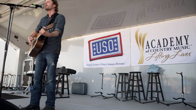 Country music artist Dierks Bentley performs during the USO/ACM Lifting Lives concert at Nellis Air Force Base in Las Vegas, NV, April 17, 2010.