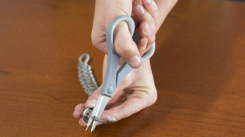 15. Tie a knot and cut off any extra cord.