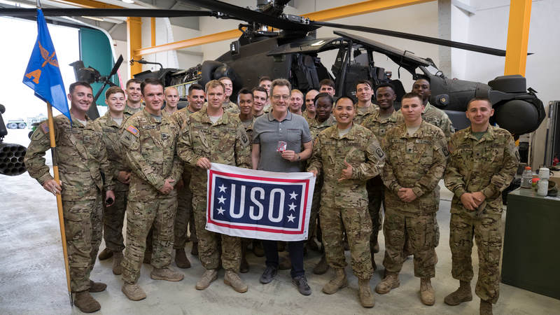 Thousands of service members and military family members turned out to meet Bryan Cranston, an award-winning actor, screenwriter, director and producer who brought his best-selling “A Life in Parts” memoir to life in an intimate theater show during a USO tour across Europe.