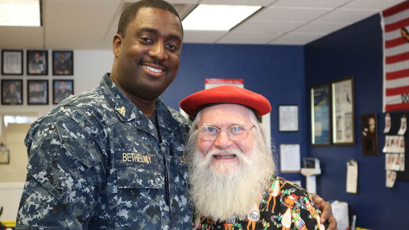 USO volunteers and staff joined Santa on a journey around the Denver area, bringing small gifts and gigantic smiles along with them.