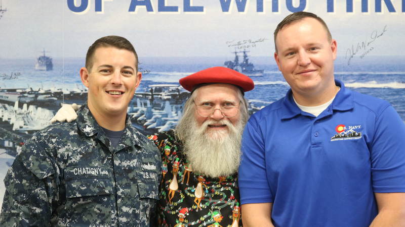 USO volunteers and staff joined Santa on a journey around the Denver area, bringing small gifts and gigantic smiles along with them.