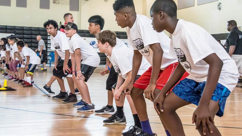 Military kids enjoyed Football ProCamp at USO Humphreys with former NFL player Steve Smith Sr.
