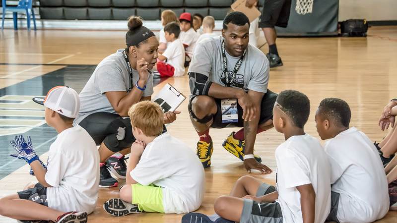 Military kids enjoyed Football ProCamp at USO Humphreys with former NFL player Steve Smith Sr.