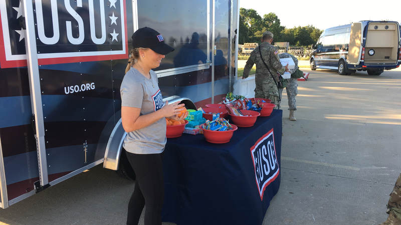 The Mobile USO program team hands out snacks and cold beverages to service members at Fort Swift, the staging location for much of the military's Harvey relief efforts.