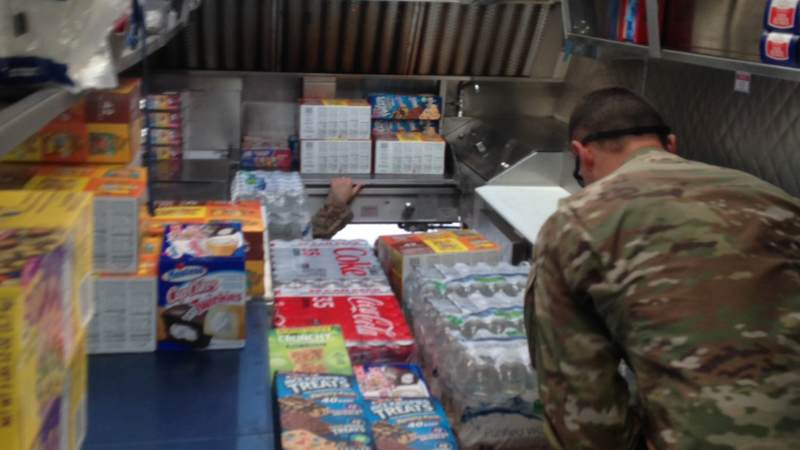 Volunteers stock the USO El Paso Mobile unit, which will head to the Houston area to provide refreshments to service members supporting Harvey relief efforts.