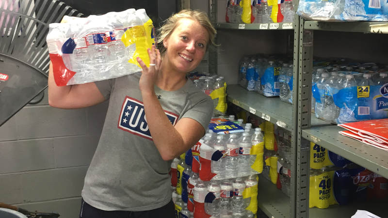 The USO Mobile staff loads up the mobile units with water.