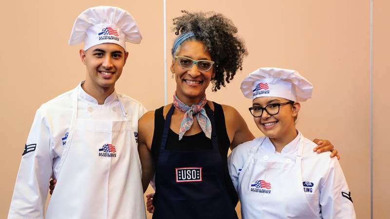Carla Hall, celebrity chef and co-host of ABC's "The Chew," went on a recent five-day USO tour to Italy and Spain to cook and connect with service members and their families.