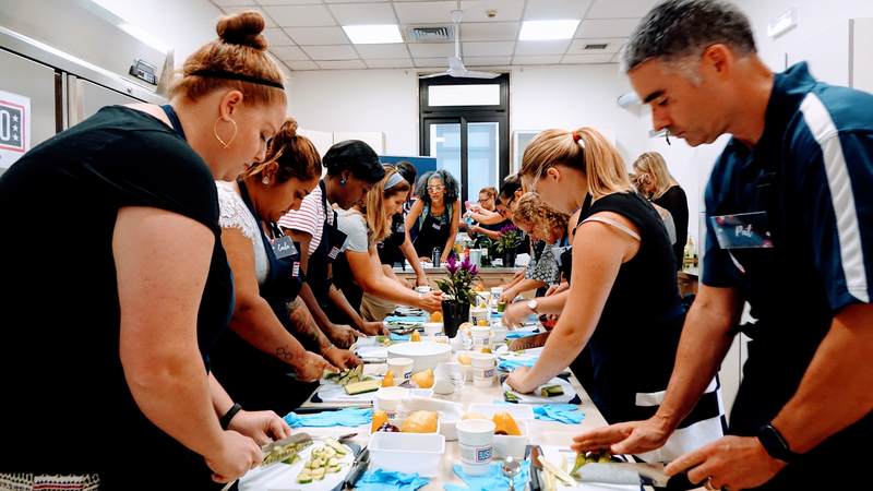 Carla Hall, celebrity chef and co-host of ABC's "The Chew," went on a recent five-day USO tour to Italy and Spain to cook and connect with service members and their families.