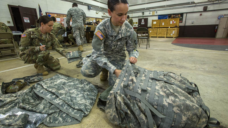 Army Spc. Sheila Velez packs as more than 130 New Jersey Army National Guard soldiers prepare to deploy to support the Florida National Guard in anticipation of Hurricane Irma.