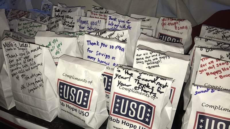 Prior to the "Pitch Perfect 3" premiere, service members, USO staff and supporters pitched in to stuff 600 care packages that will be delivered to some of the 1,350-plus California National Guard members activated to fight the Southern California wildfires.