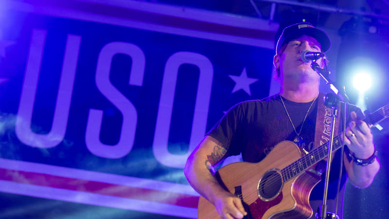 Country music artist Jerrod Niemann performs during Chairman’s USO Holiday Tour at Morón Air Base, Spain, Dec. 21.
