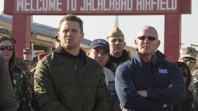 WWE Superstar "The Miz," Chef Robert Irvine and comedian Adam Devine arrive at Operating Base Fenty, Afghanistan, Dec. 24.
