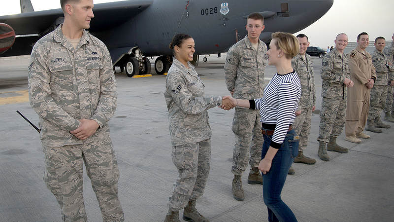 During Day 3 of the holiday visit, Scarlett greets part of the bomber ground crews at Al Udeid Air Base in Qatar.