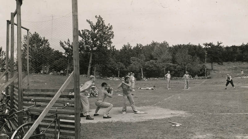 Service members play baseball in Flatts Village, Bermuda, in the 1940s
