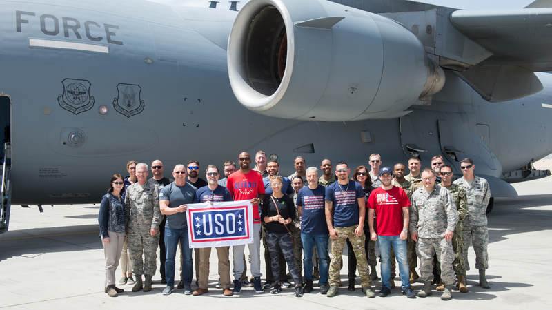 Entertainers pose for a photo in front of a C-17 aircraft at Bagram Air Field before headed for Kandahar Air Field, Afghanistan, the fourth stop on the annual Vice Chairman’s USO Tour. Army photo by Sgt. James McCann