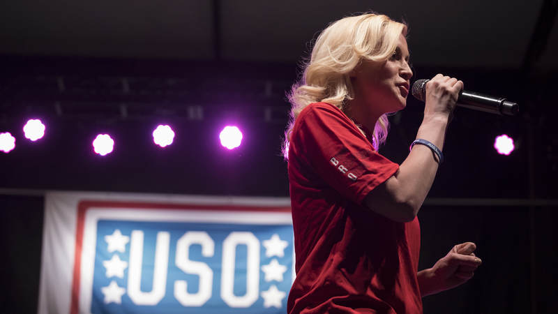 Country recording artist Kellie Pickler performs for the crowd at Fort Riley, Kansas.