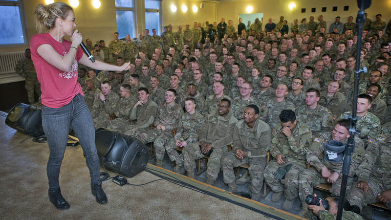 Iliza Shlesinger performs for troops in Poznan, Poland during the 2017 USO Holiday Tour.