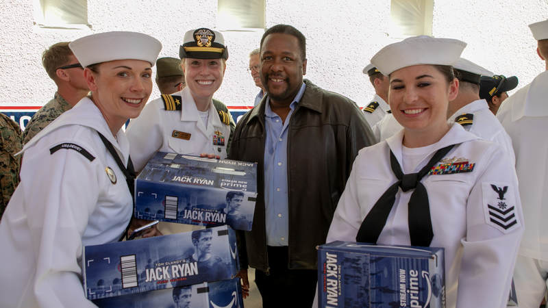 Actor Wendell Pierce, who stars in the new Amazon Prime series, "Tom Clancy's Jack Ryan," poses with sailors during a USO tour during Los Angeles Fleet Week on August 31.