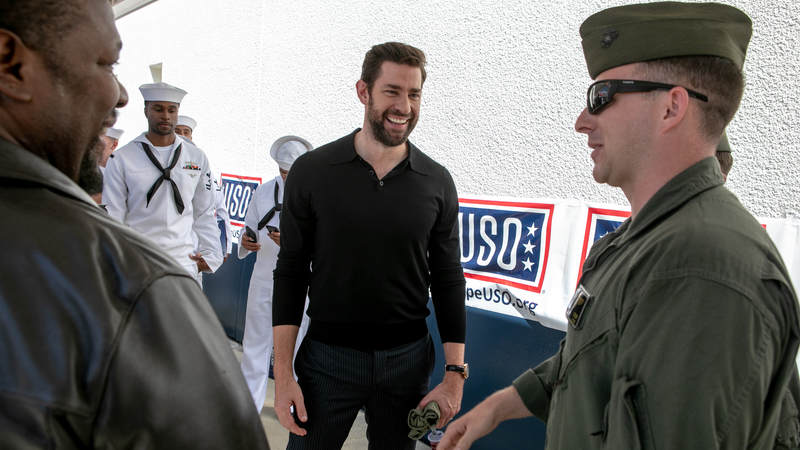 Actors Wendell Pierce, left, and John Krasinski, co-stars of the new Amazon Prime series, "Tom Clancy's Jack Ryan," connect with service members during a USO tour during Los Angeles Fleet Week on August 31.