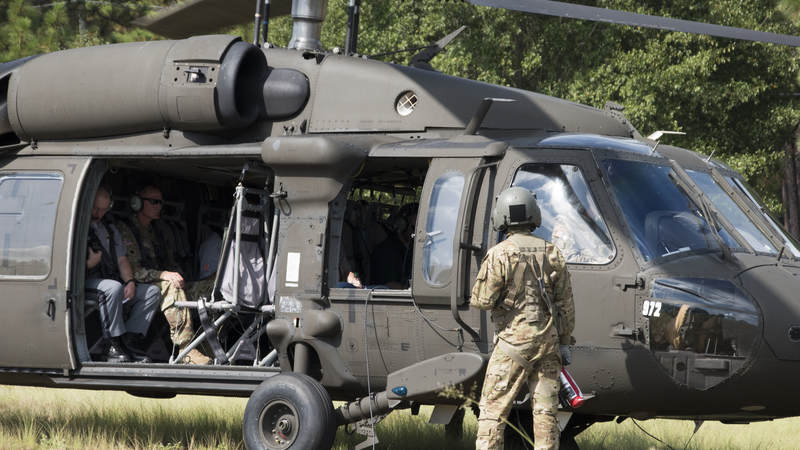 South Carolina National Guard soldiers conduct pre-flight checks before lifting off ahead of Hurricane Florence.