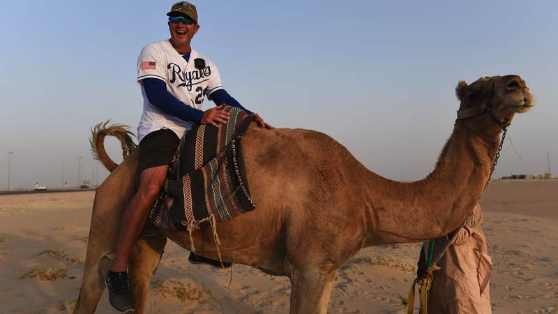 Former Kansas City Royals designated hitter and first baseman Mike Sweeney, who played for the Royals for 13 seasons, gets a taste of life in Kuwait while on tour with the USO. USO Photo by Neal Preston.