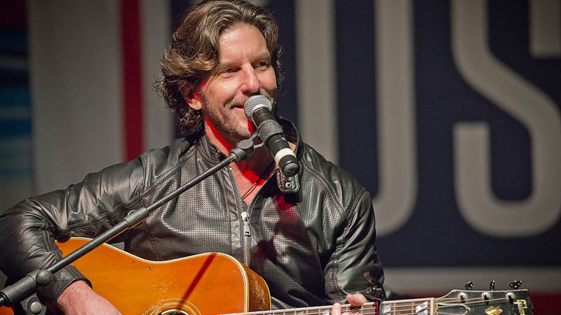 Singer-songwriter and record producer Brett James performs one of his hits for service members and their families.