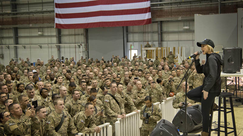 Country music star Kellie Pickler performs a USO concert for troops stationed at Bagram Air Base in Afghanistan as part of a six-day, five-country USO holiday tour led by Army General Martin Dempsey in 2014.