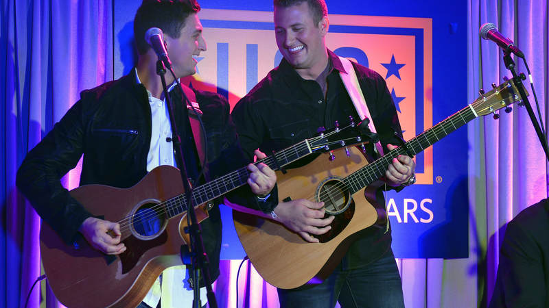 Justin Wright and Andrew Yavocone of the band Interstate 10 perform.