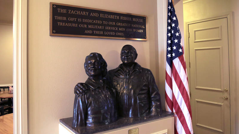 A bust of Zachary and Elizabeth Fisher, the organization's co-founders, sits near the front door.