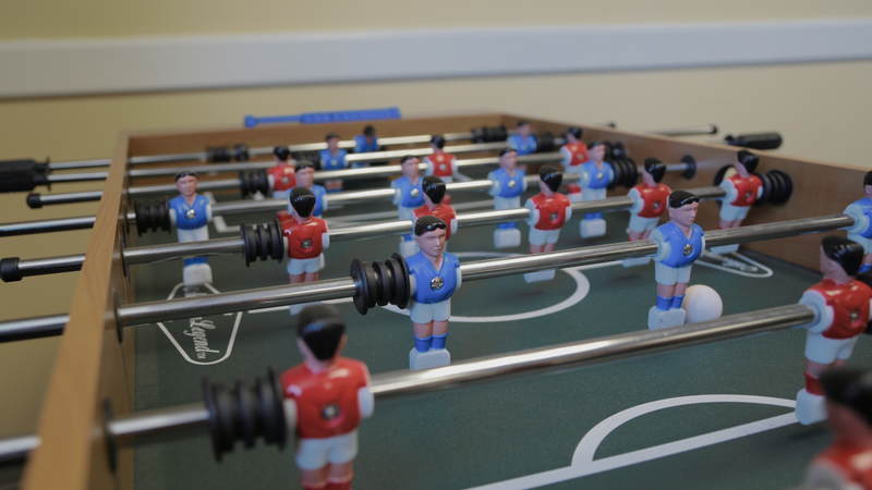 In addition to video gaming stations, TVs, snacks and recliners, the USO location inside the San Antonio Military Entrance Processing Station also features a foosball table and board games.